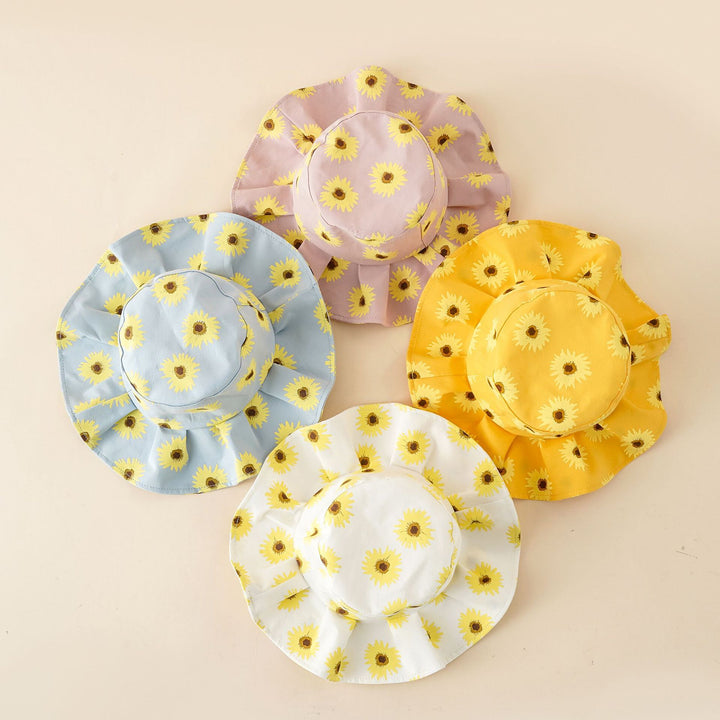 Damen Sonnenhut mit breiter Rüschenkrempe und Sonnenblumen‑Print – Avérine
