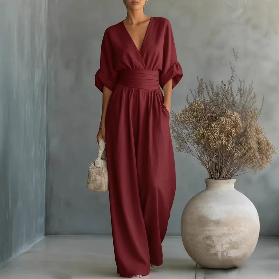 Echoarchiv | Eleganter Ärmelloser Jumpsuit mit Tiefem V-Ausschnitt, Taillenbund und Weitem Bein