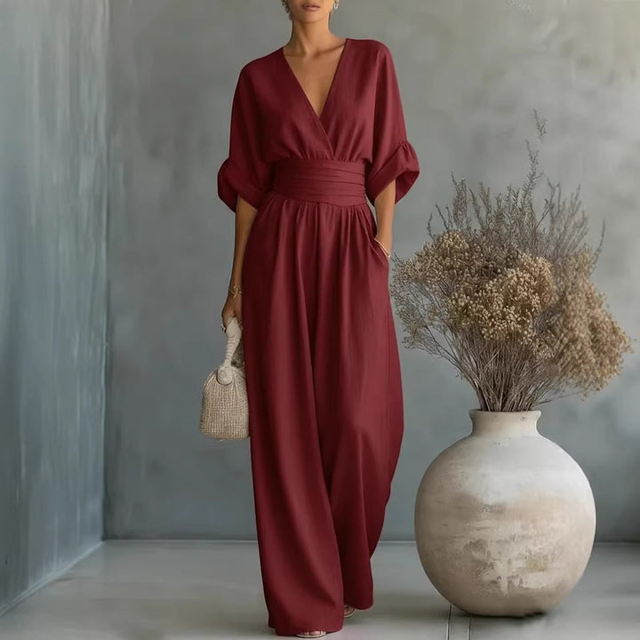 Echoarchiv | Eleganter Ärmelloser Jumpsuit mit Tiefem V-Ausschnitt, Taillenbund und Weitem Bein