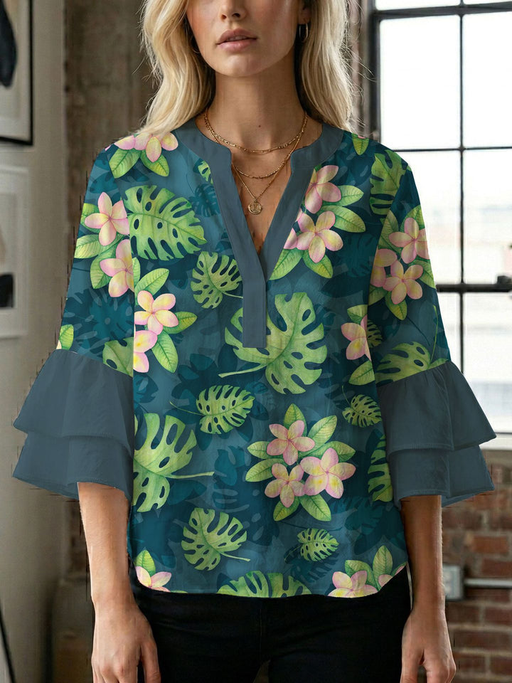 Damen Blusenshirt mit voluminösen Ärmeln und kreativem Druckdesign Echo Archiv