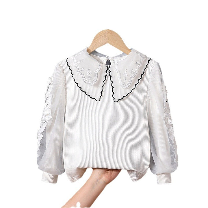 Mädchen modische Bluse mit eleganten Tüllärmeln und kunstvoller Spitzenverzierung Echo Archiv