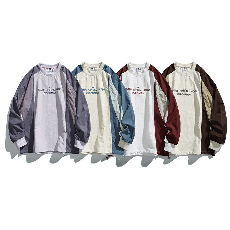 Unisex Weitgeschnittenes Colorblock-Langarmshirt aus leichter Nylon-Mischung mit Raglanärmeln und Brustprint Echo Archiv