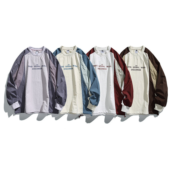 Unisex Weitgeschnittenes Colorblock-Langarmshirt aus leichter Nylon-Mischung mit Raglanärmeln und Brustprint Echo Archiv
