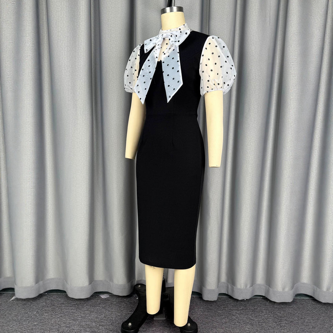 Damen figurbetontes Midi-Kleid mit transparenten Puffärmeln und Schleifenkragen Echo Archiv