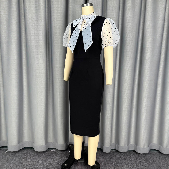 Damen figurbetontes Midi-Kleid mit transparenten Puffärmeln und Schleifenkragen Echo Archiv