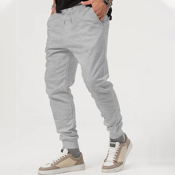 Herren nan tapered Jogginghose mit elastischem Tunnelzugbund, praktischen Eingrifftaschen und schmalem Bündchenabschluss Echo Archiv