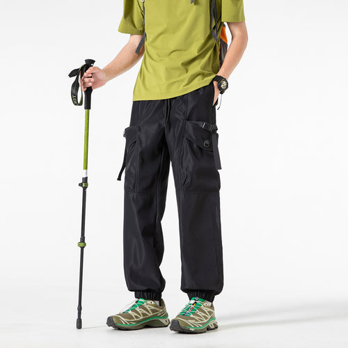 Unisex Weite Technical-Cargo-Jogginghose mit verstellbarem Tunnelzug, großen Klapptaschen und elastischem Knöchelabschluss Echo Archiv