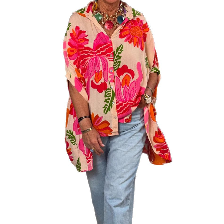 Damen nan luftige Oversize-Hemdbluse im Resortstil mit großflächigem Blumenprint und asymmetrischem Zipfelsaum Echo Archiv
