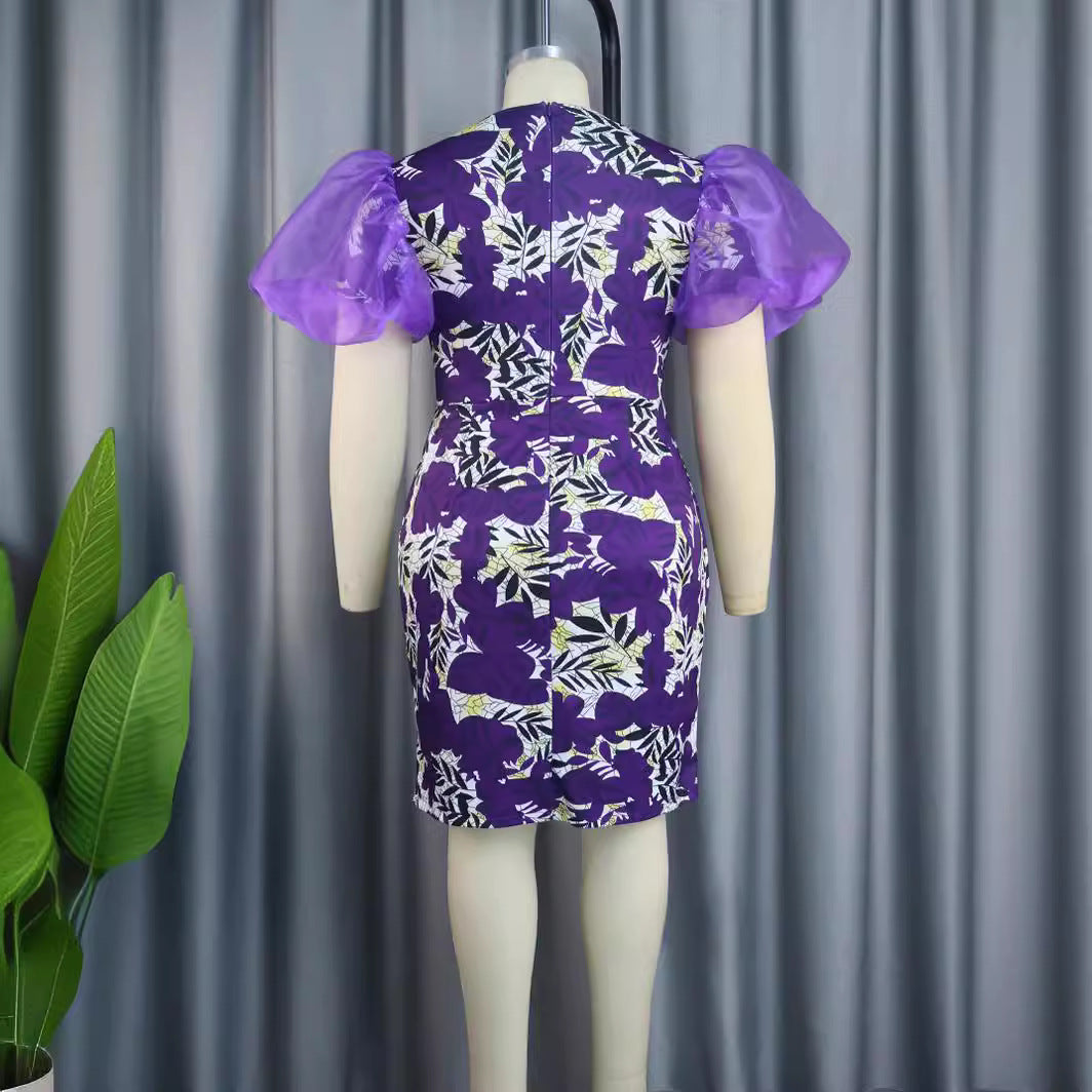 Damen Kleid mit floralem Muster und voluminösen Chiffonärmeln Echo Archiv