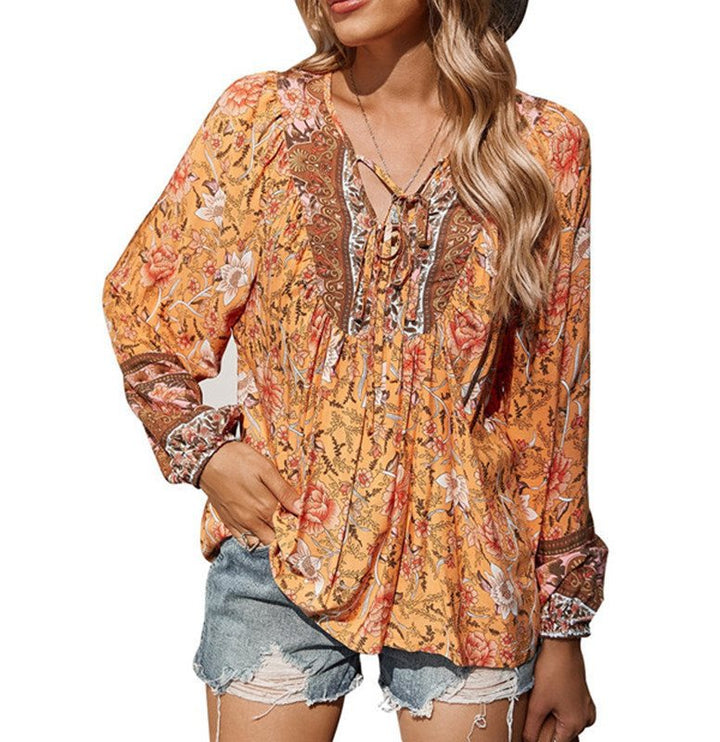 Damen Boho-Bluse mit floralem Print, V‑Ausschnitt mit Bindeband und Plissée-Details Echo Archiv