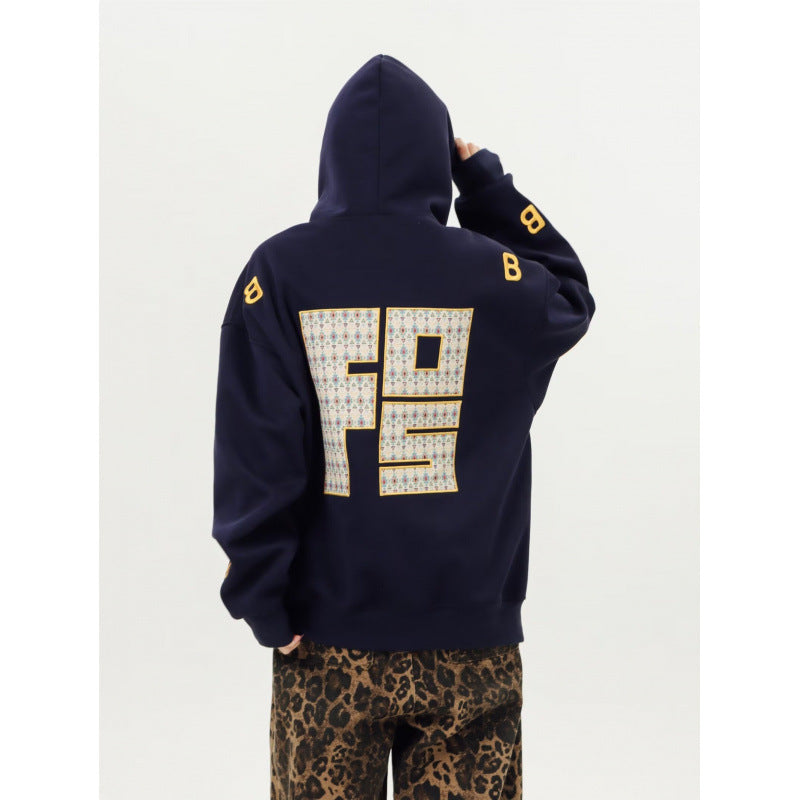 Unisex Oversized Kapuzenpullover mit großflächigem Intarsien‑Blockprint und geripptem Saum Echoarchiv