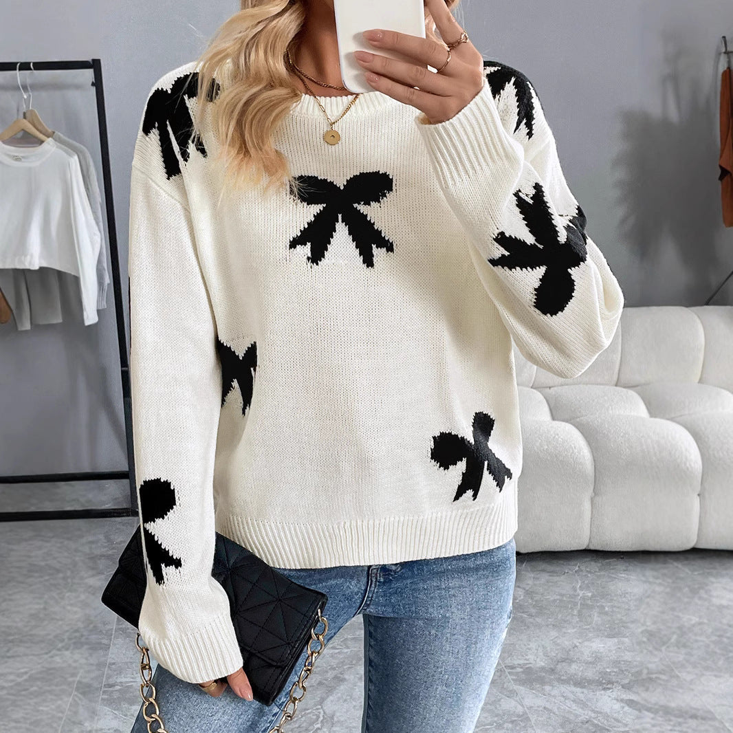 Damen Gestrickter Rundhals-Pullover mit Schleifen-Jacquard und relaxed Fit Echoarchiv