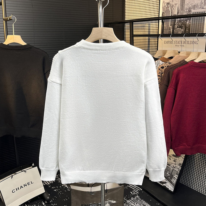 Herren Strukturierter Patchwork-Strickpullover mit Rundhals und gerippten Einsätzen Echoarchiv
