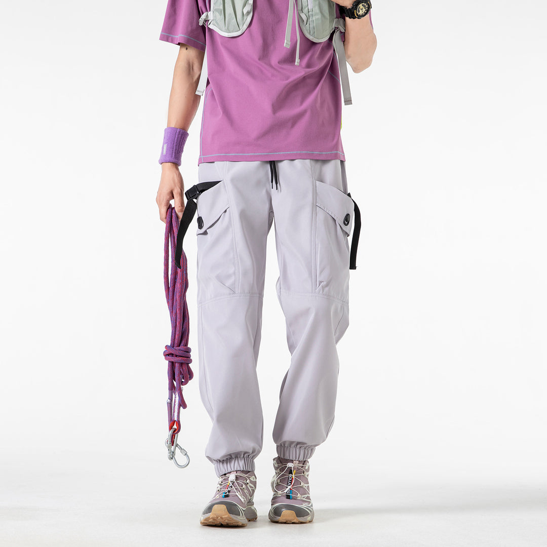 Unisex Weite Technical-Cargo-Jogginghose mit verstellbarem Tunnelzug, großen Klapptaschen und elastischem Knöchelabschluss Echo Archiv
