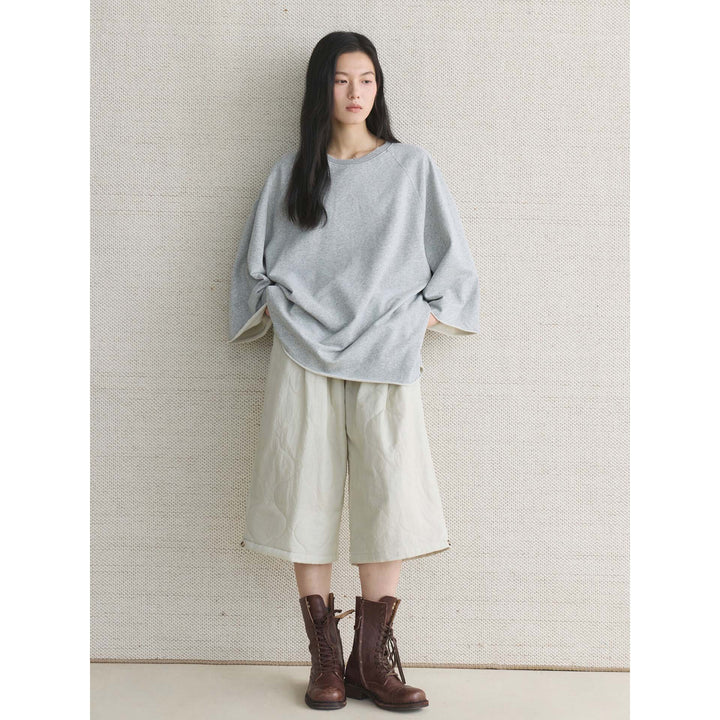 Damen Oversized Sweatshirt mit rohem Halsausschnitt und weiten Raglanärmeln Echoarchiv