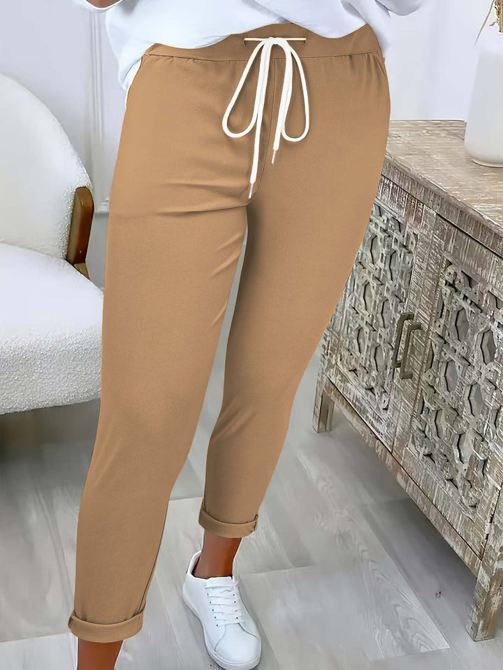 Damen Slim-Fit Jogginghose mit Tunnelzug und Umschlagbündchen Echoarchiv