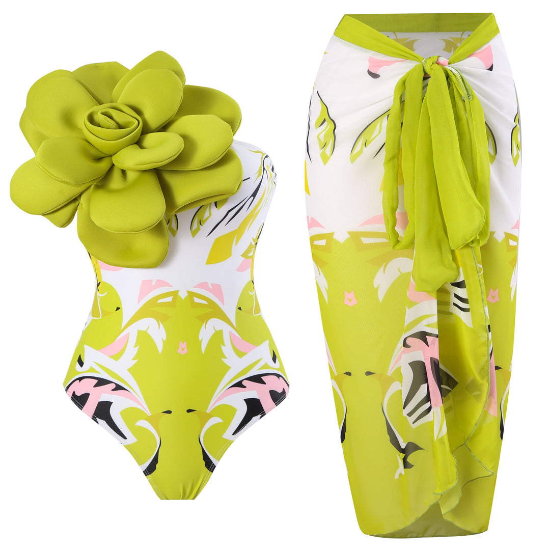 Damen Eleganter Badeanzug mit großem Blumen-Detail und transparentem Überrock Echo Archiv