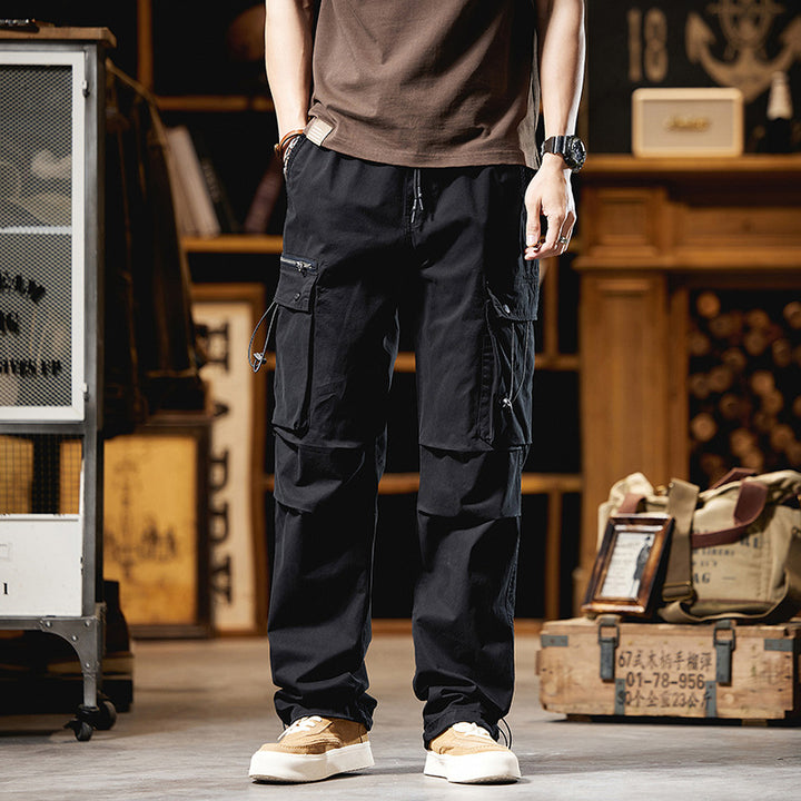 Herren Lockere Baumwoll‑Cargo‑Hose mit Tunnelzugbund, Knieabnähern und Multifunktionsklappen Echo Archiv