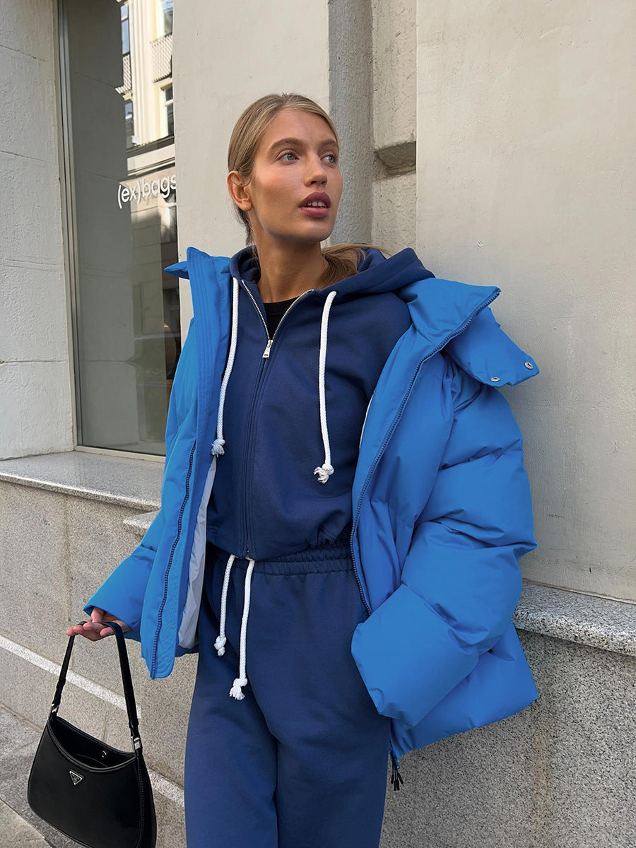 Damen Oversize Steppjacke mit Kapuze und wattierter Thermofüllung Echoarchiv
