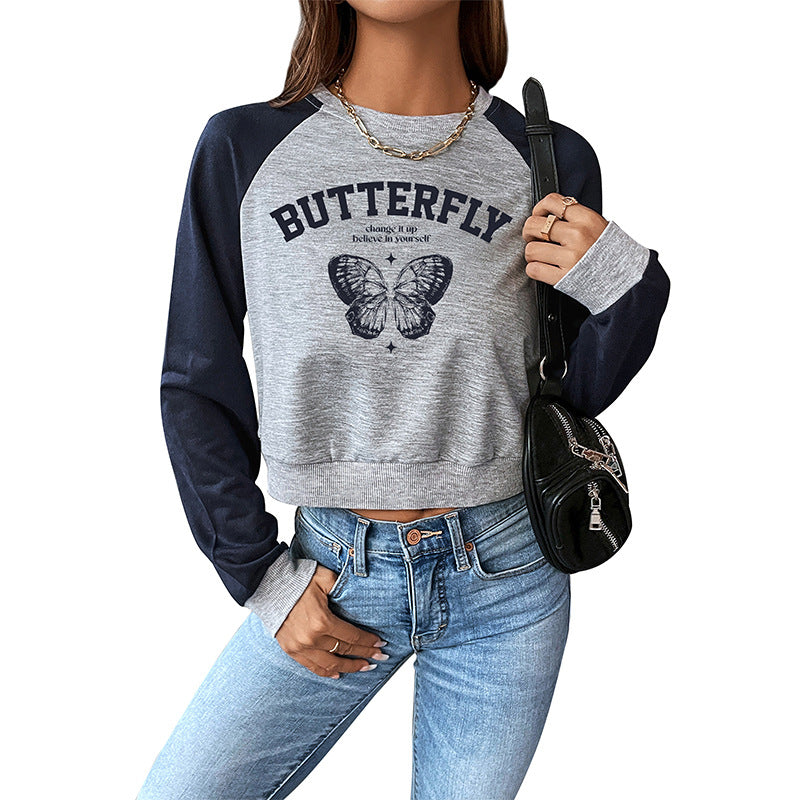 Damen Cropped Raglan-Sweatshirt mit Schmetterling-Print, geripptem Saum und lässiger Passform Echoarchiv