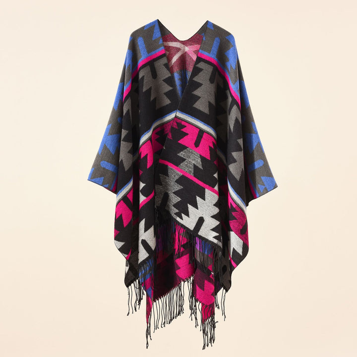 Damen Oversize-Ruana mit V‑Ausschnitt, grobem Jacquardmuster und langen Fransen Echo Archiv