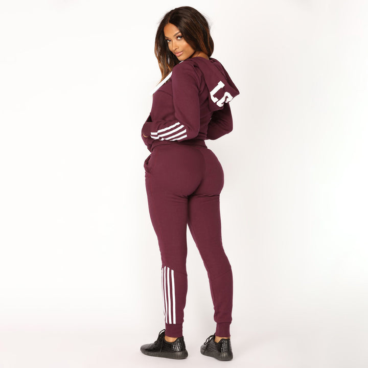 Damen sportliches Zip-Hoodie und Slim-Jogger-Set aus French-Terry mit kontrastierenden Streifen – Avérine