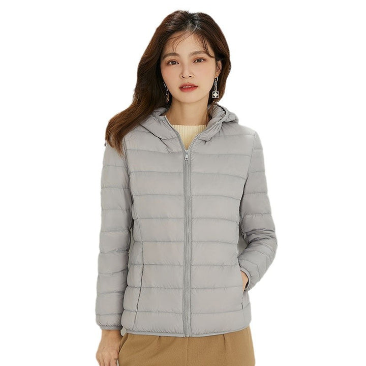 Damen Ultraleichte gesteppte Kapuzenjacke mit ultraflacher Thermowatte Echoarchiv