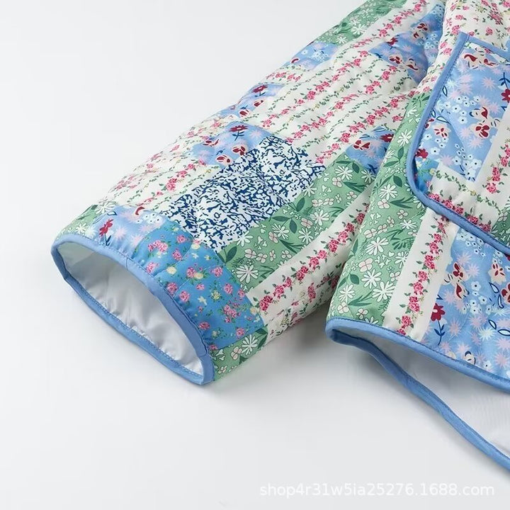 Damen Steppjacke im Patchwork-Quiltstil mit Schalkragen und aufgesetzten Taschen Echo Archiv