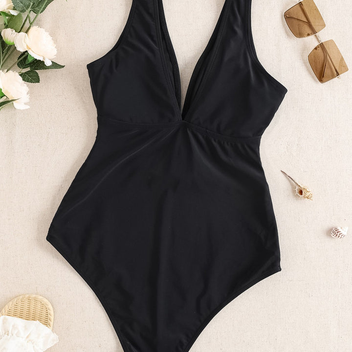 Damen Einteiliger Badeanzug mit tiefem V-Ausschnitt und eleganter Gürteldetails Echo Archiv
