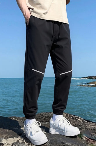 Herren Sportliche Jogginghose mit seitlichem Reißverschluss Echo Archiv