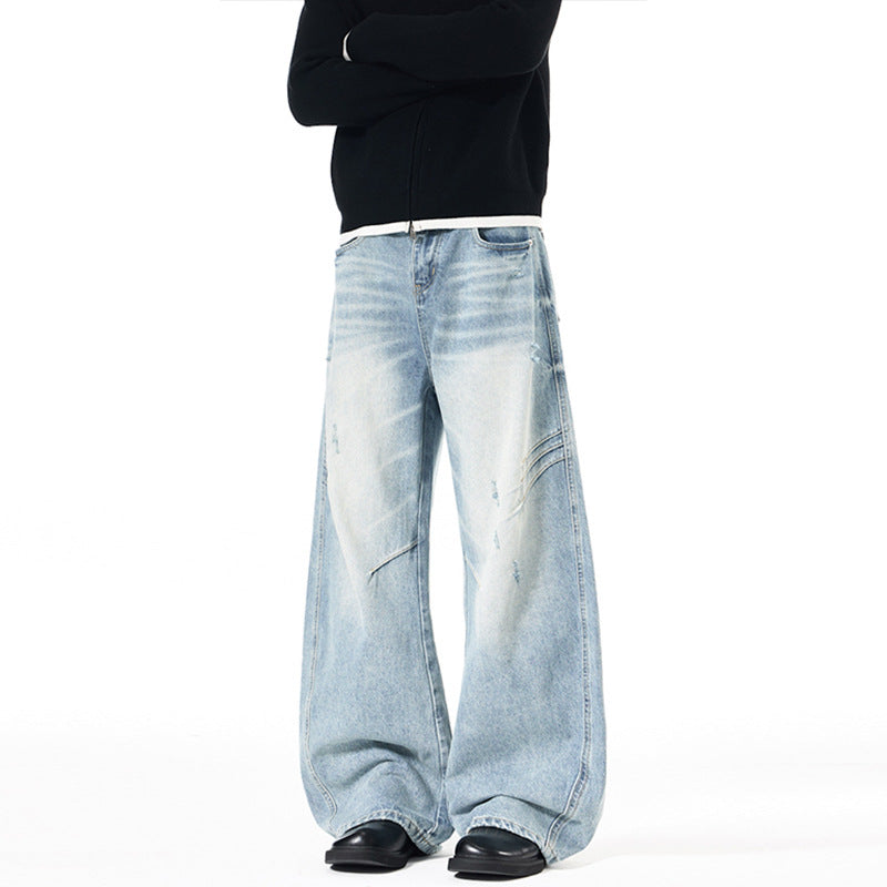 Herren Ultraweite Denim-Palazzohose mit skulpturalen Seitenbahnen und Used‑Effekt Echo Archiv
