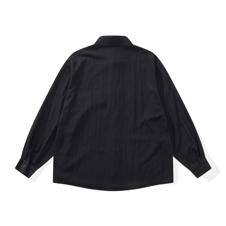Unisex Oversized Hemdjacke im Patchwork‑Design Echoarchiv