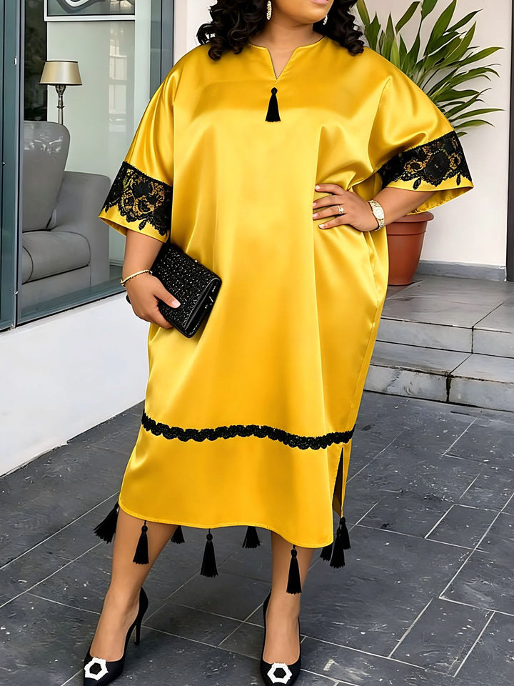 Damen elegantes Kaftankleid mit raffinierten Spitzenärmel und dekorativen Quasten Echo Archiv