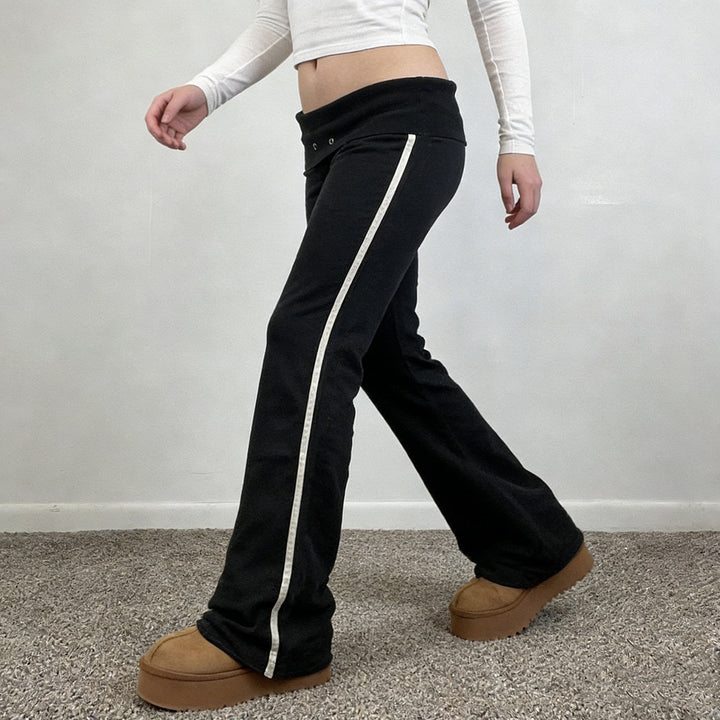 Damen Fließende Palazzo-Hose mit hohem Bund und dekorativen Ösen Echo Archiv