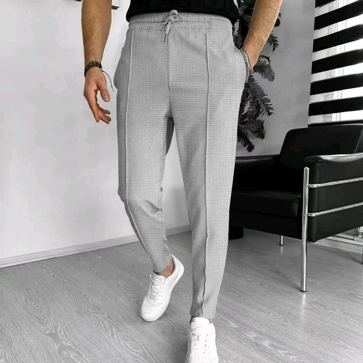 Herren Modische Chinohose mit elastischem Bund und praktischen Taschen Echoarchiv