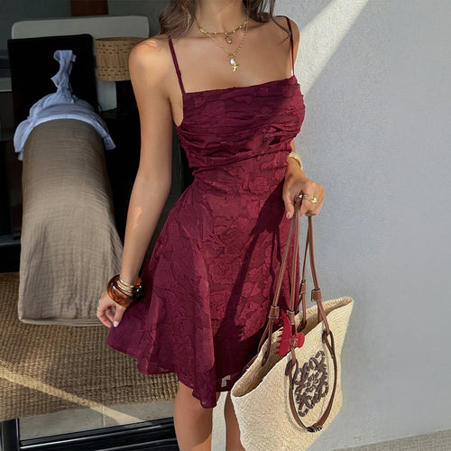 Damenkleid mit verführerischem Rückenausschnitt und Blumenmuster – Echo Archiv