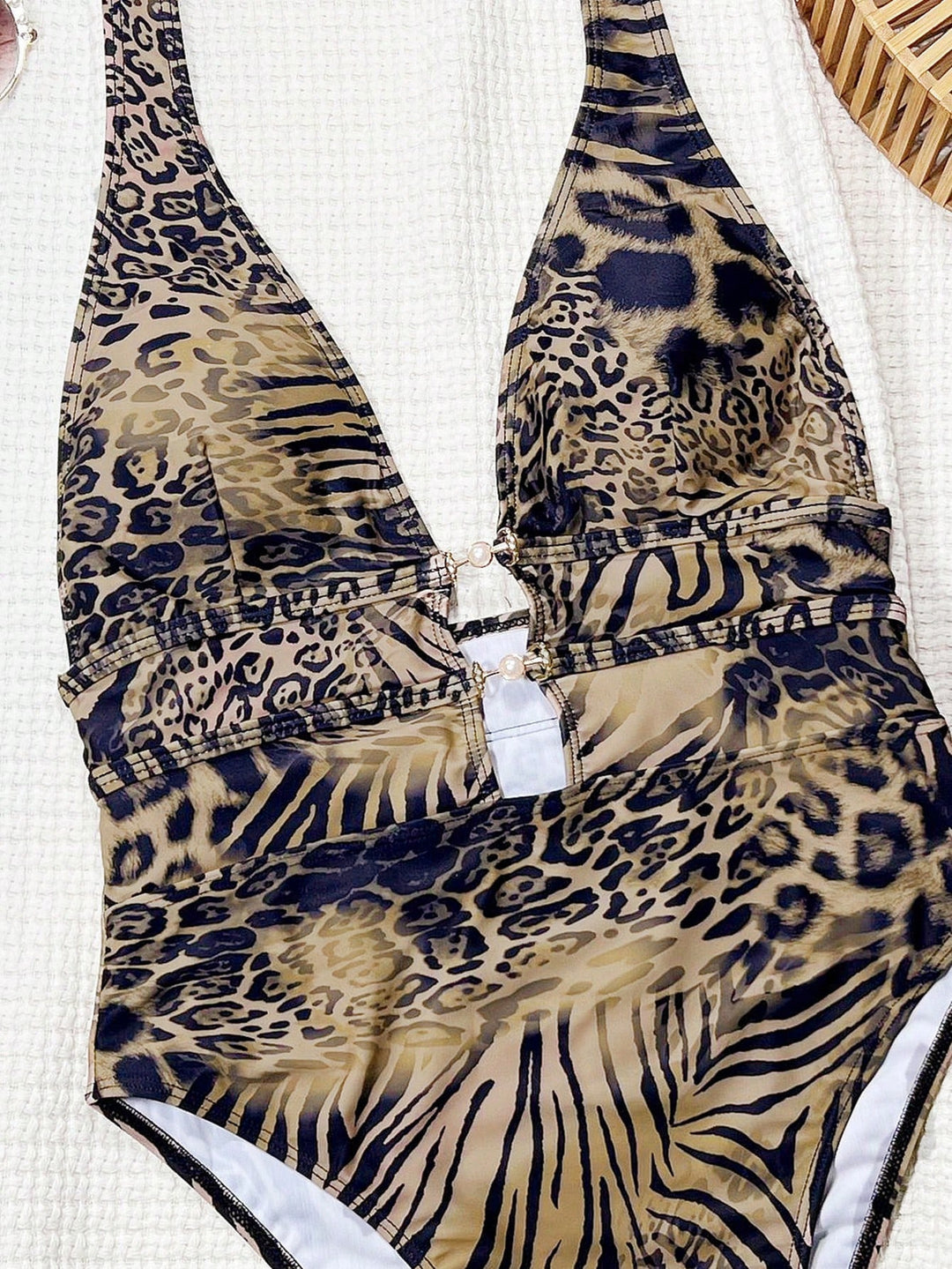 Damen Designer Badeanzug mit tiefem V-Ausschnitt und Riemen Echo Archiv