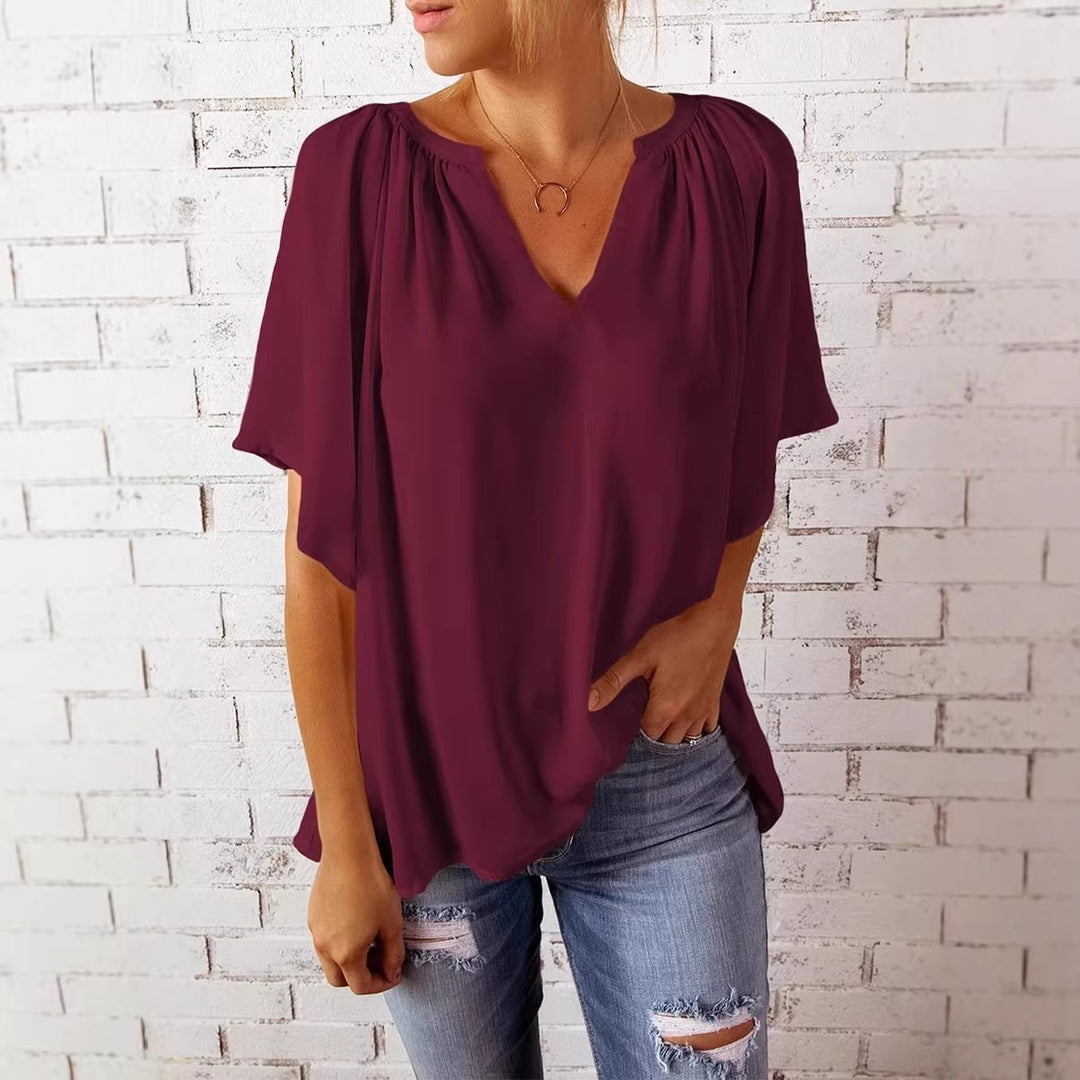 Damen lockeres Blusenshirt mit V-Ausschnitt und luftigen Ärmeln Echo Archiv