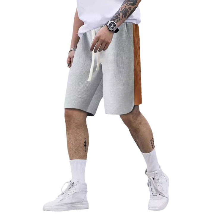 Herren stylische Freizeithose mit atmungsaktiver Struktur und seitlichen Kontraststreifen Echoarchiv