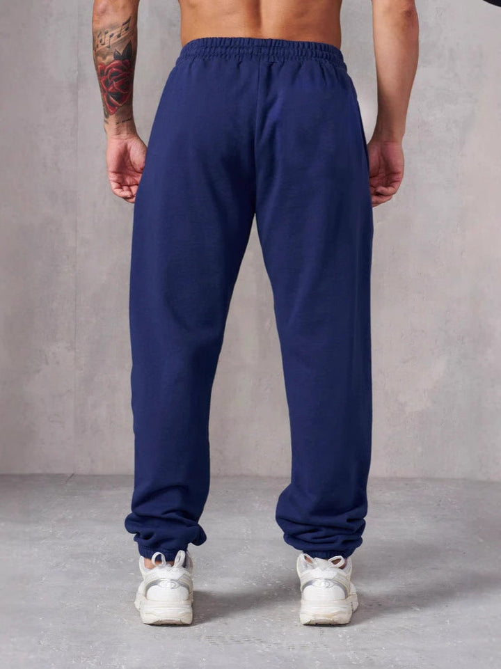 Herren Baggy Jogginghose mit elastischem Bund und seitlichen Taschen – Sorevano