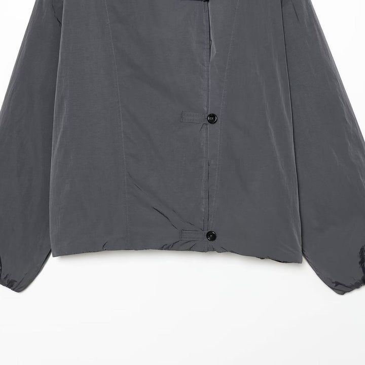 Damen Leichte Cropped Nylonjacke mit hohem Funnelkragen, Oversize-Schnitt und elastischen Bündchen Echoarchiv