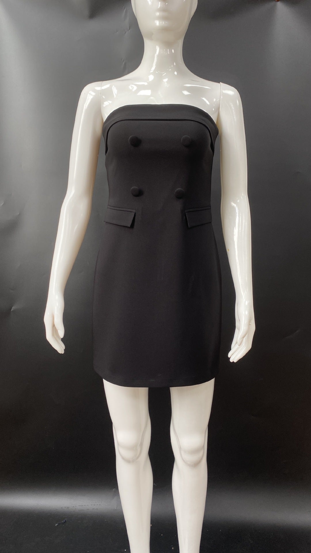 Damen Schickes Cocktailkleid mit unkonventionellem Bustier-Oberteil und Knopfdetails Echo Archiv