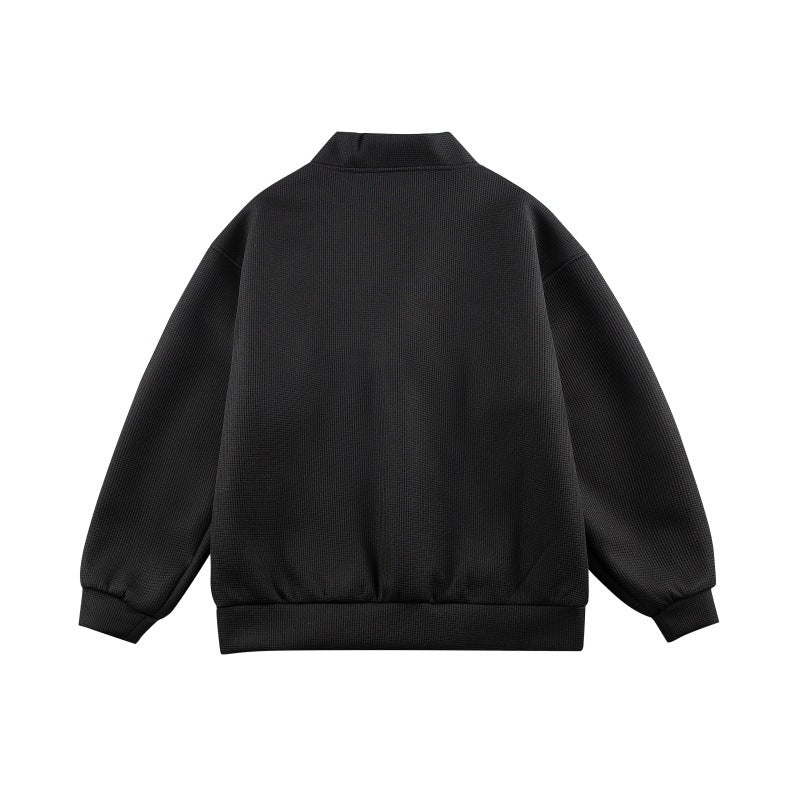 Unisex Boxy-Strickjacke im Waffelstrick mit V-Kragen, durchgehender Knopfleiste und aufgesetzten Rundtaschen Echoarchiv