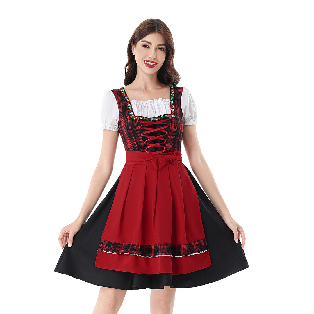 Damen nan traditionelles Dirndlkleid mit kariertem Mieder, Schnürung, Puffärmeln und Schürze Echo Archiv
