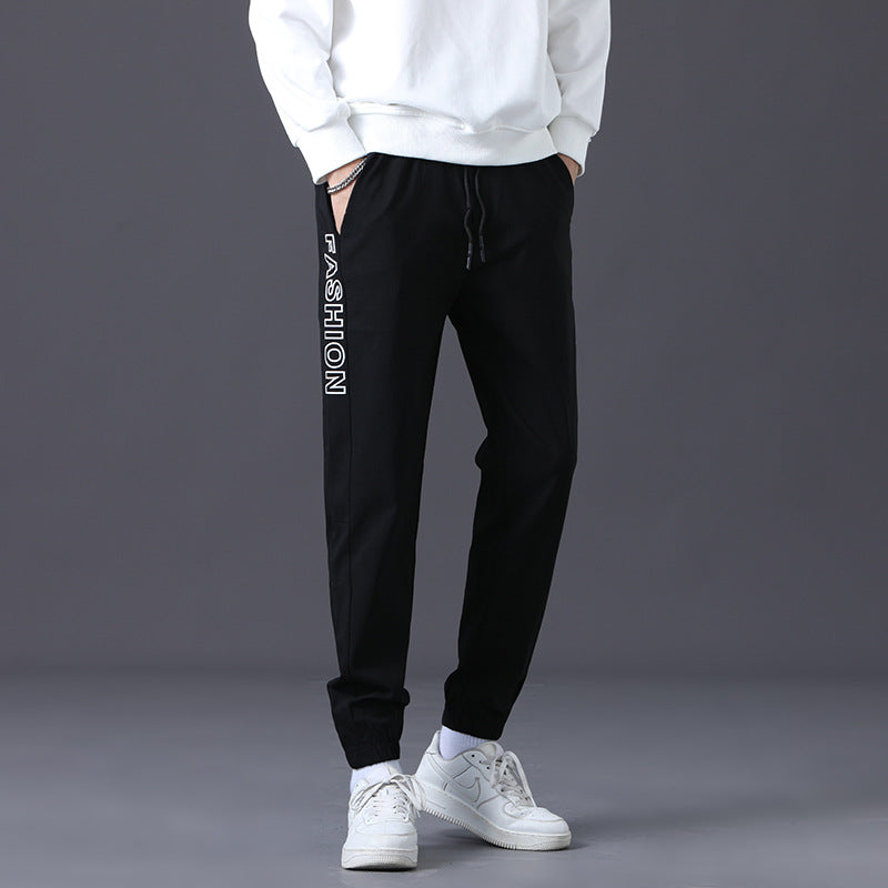 Herren modische Jogginghose mit elastischem Bund und seitlichen Taschen Echoarchiv