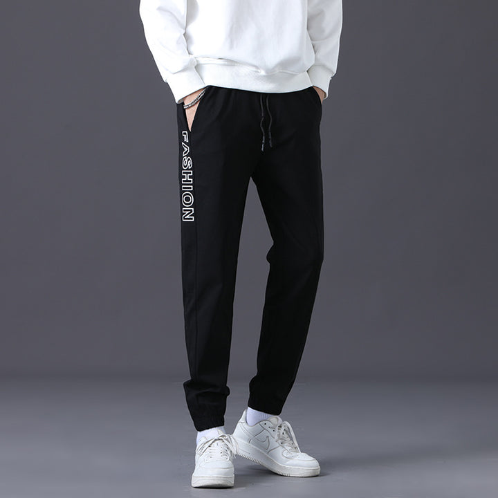 Herren modische Jogginghose mit elastischem Bund und seitlichen Taschen Echoarchiv