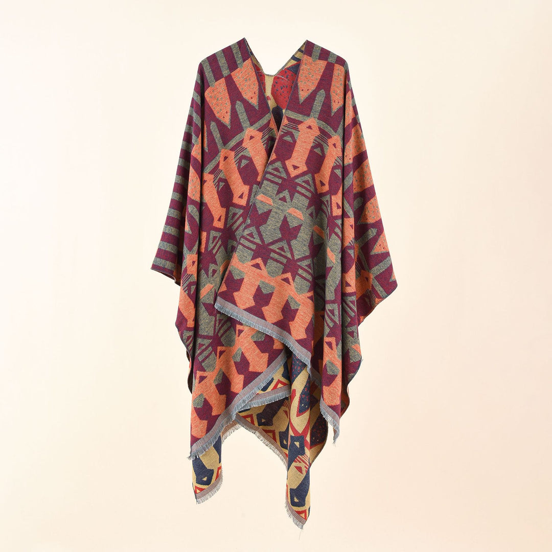 Damen Strick-Überwurfcape im Ruana-Stil mit grafischem Jacquard und Fransensaum Echo Archiv