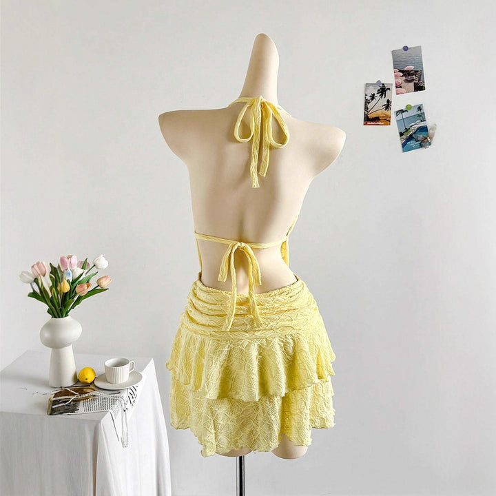 Damen Minikleid mit raffiniertem Wickel-Ausschnitt und dekorativen Rüschen Echo Archiv