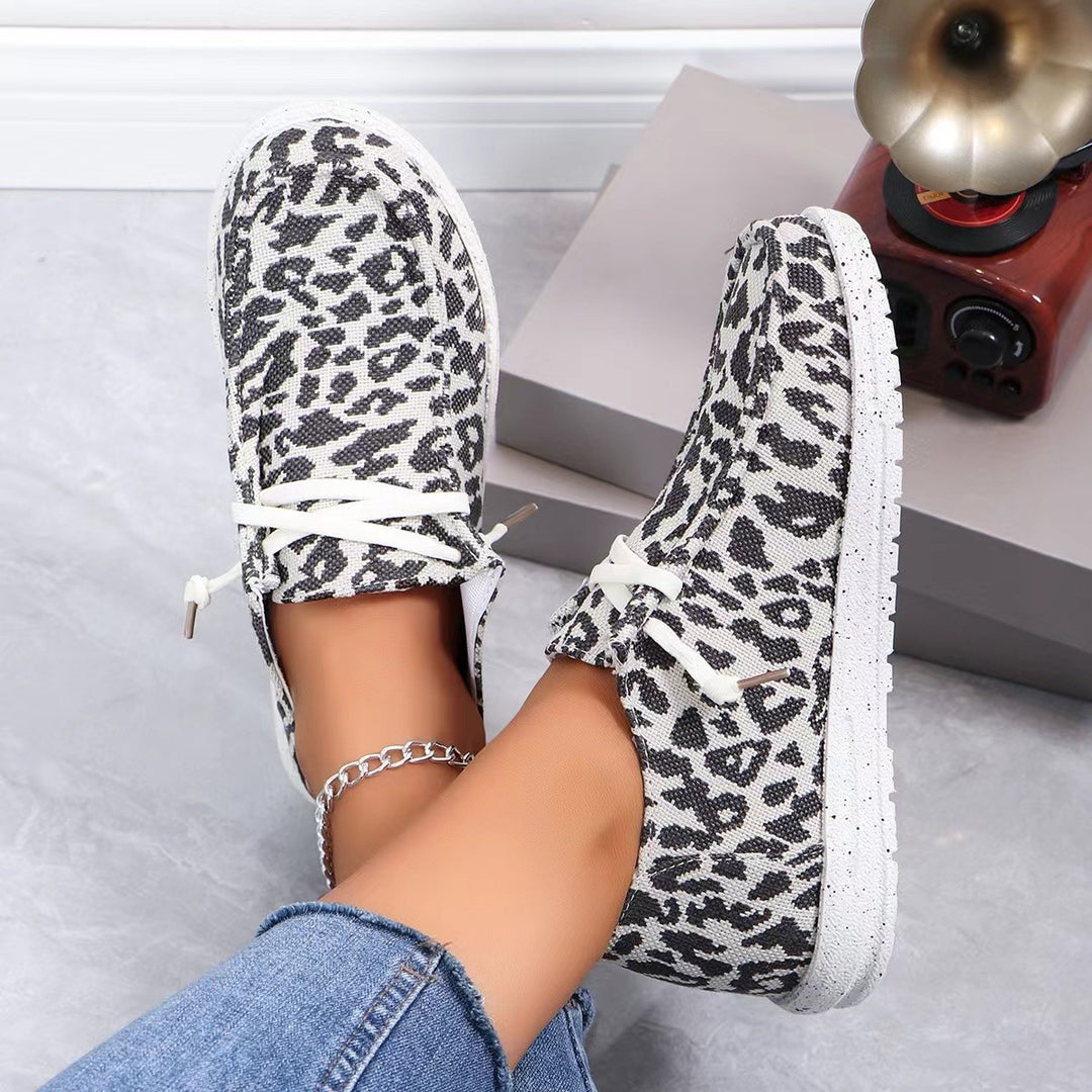 Damen Slip-On Sneaker im Leoprint mit Canvas-Obermaterial und elastischem Schnürband Echoarchiv