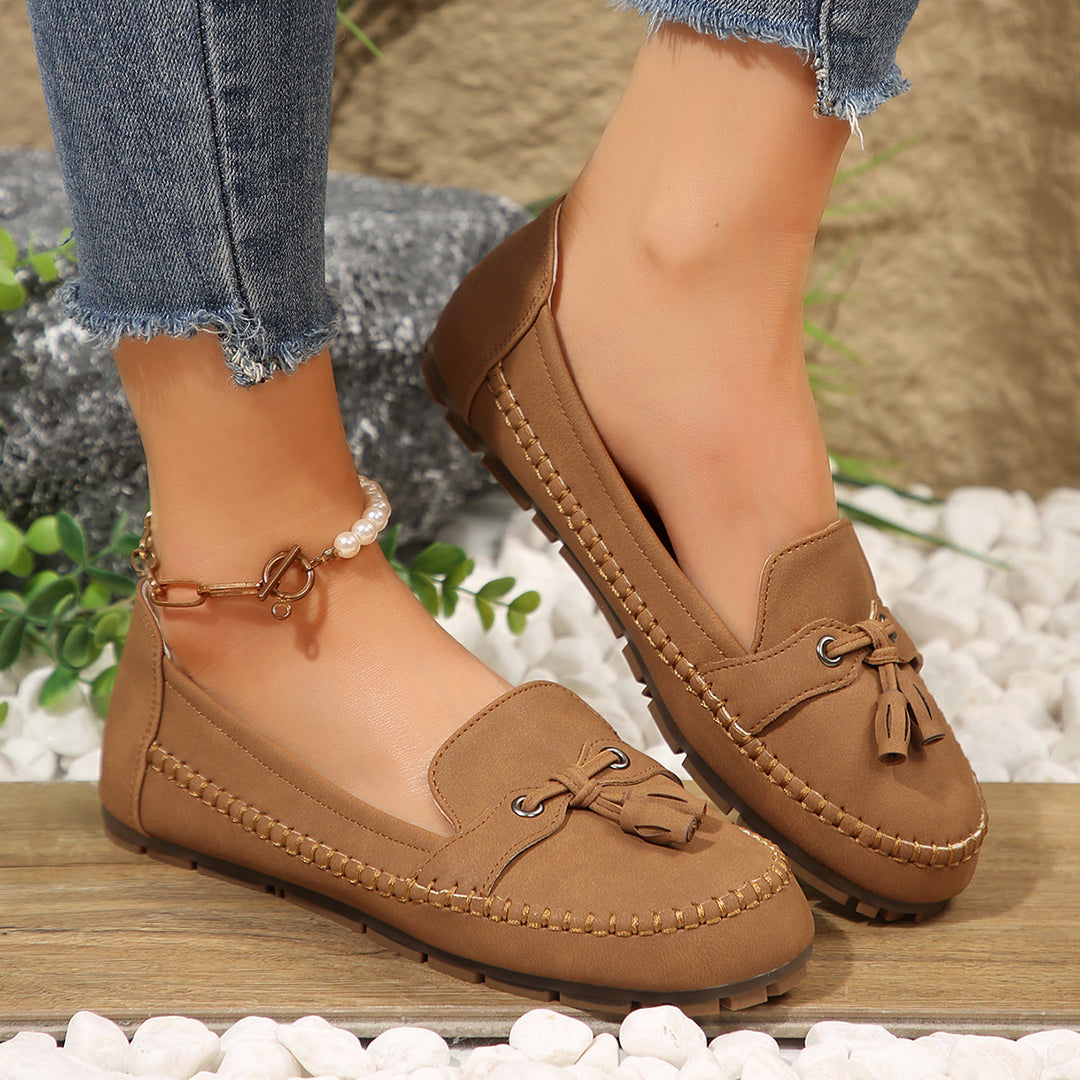 Damen  klassische Mokassin-Slipper mit Quasten, handgenähter Rahmennaht und rutschfester Gummisohle Echo Archiv